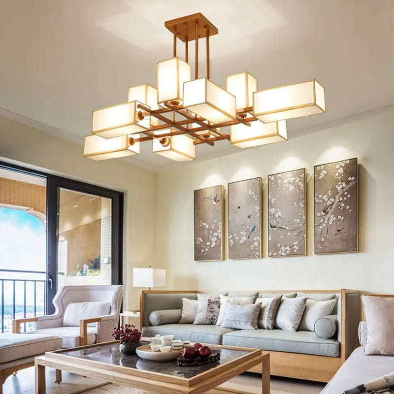 A living room featuring a black geometric semi-flush ceiling light.