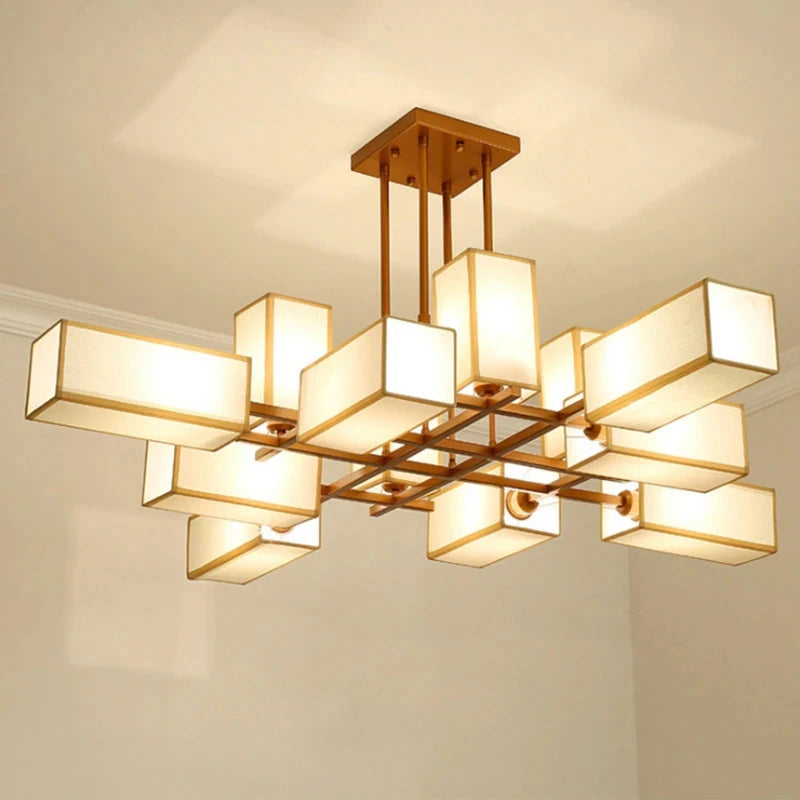 Close-up of the black geometric frame and fabric shades of the semi-flush ceiling light.