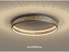 Ceiling light fixture with decorative pattern on a ceiling