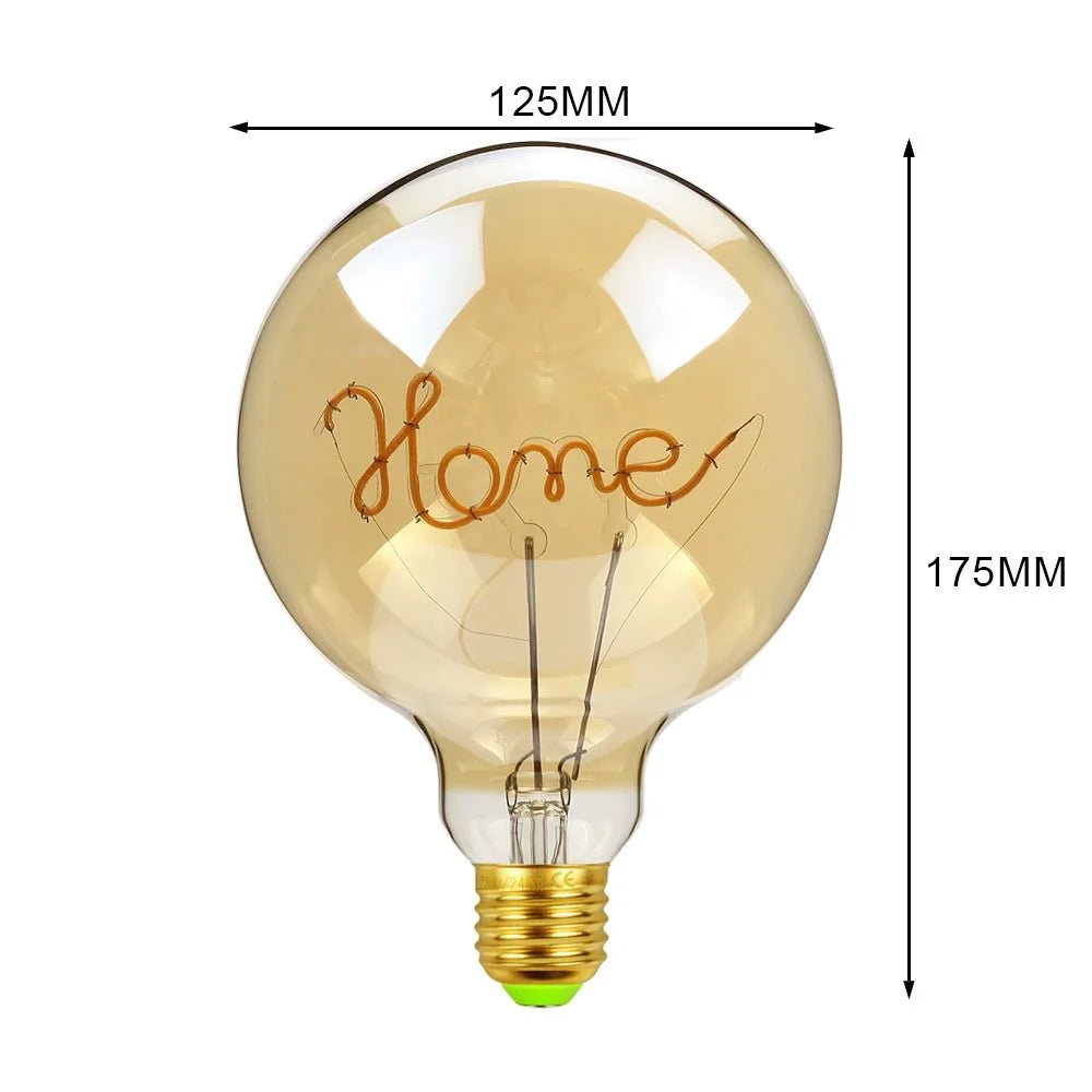 Decorative light bulb with 'Home' engraving and dimensions on a white background