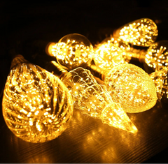 Decorative light bulbs with string lights on a dark background