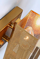 Gold textured rectangular object with a textured surface on a white background