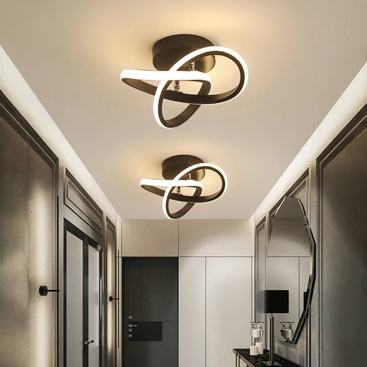 Modern black swirl LED semi-flush ceiling light fixture in a hallway