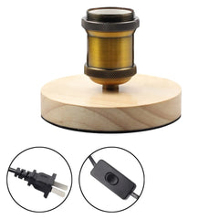 Wooden lamp base with brass fitting and electrical components on a white background