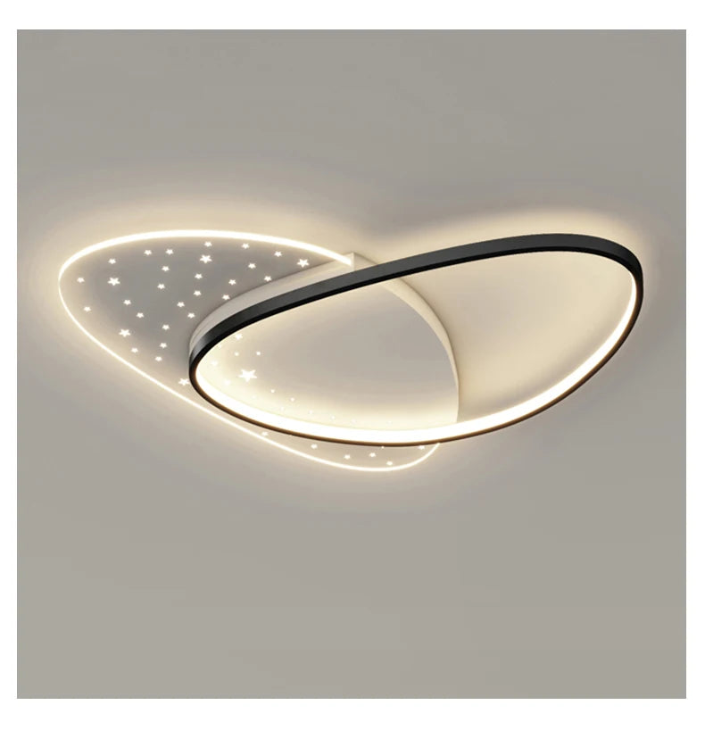 Modern ceiling light fixture with two circular designs on a plain background