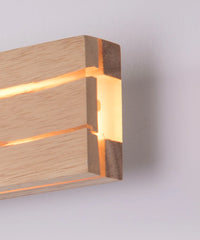 Wooden wall light fixture on a white background