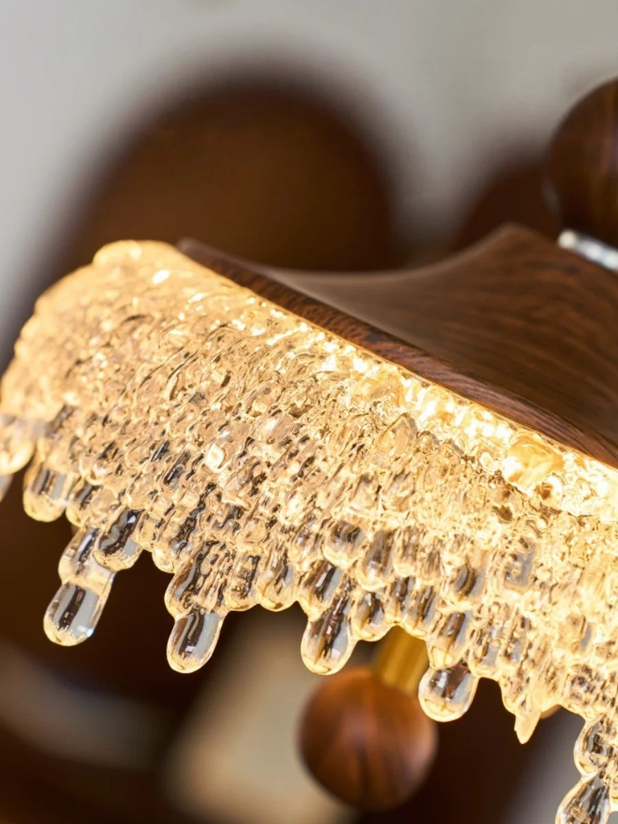 Close-up of a decorative lampshade with crystal details on a blurred background