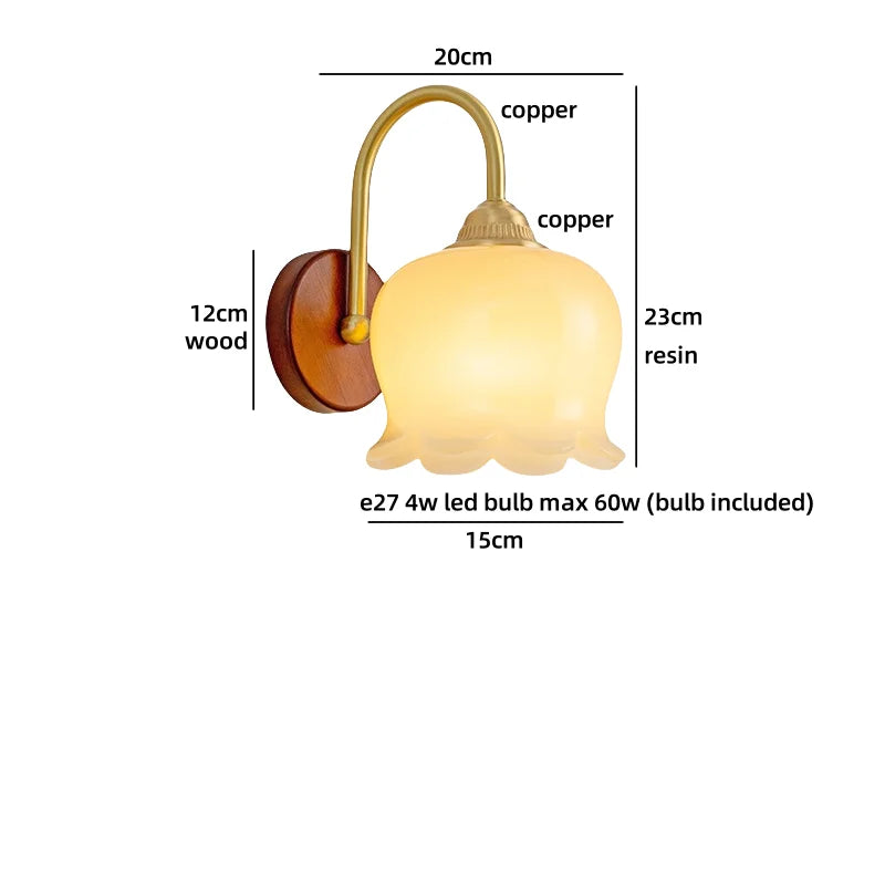 Wall-mounted light fixture with dimensions labeled on a white background