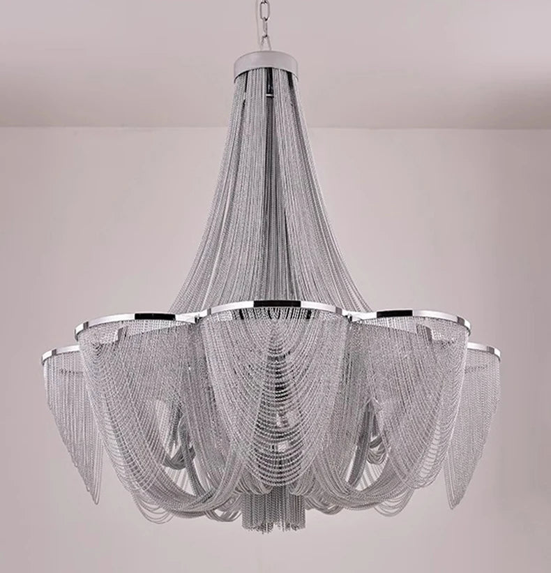 Chandelier with silver mesh design on a plain background
