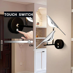 Modern wall sconce with touch switch feature in a home interior setting.