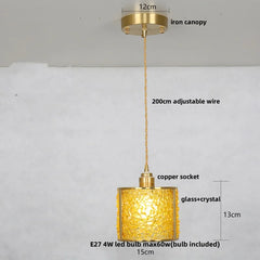Gold pendant light with measurements and details on a white background
