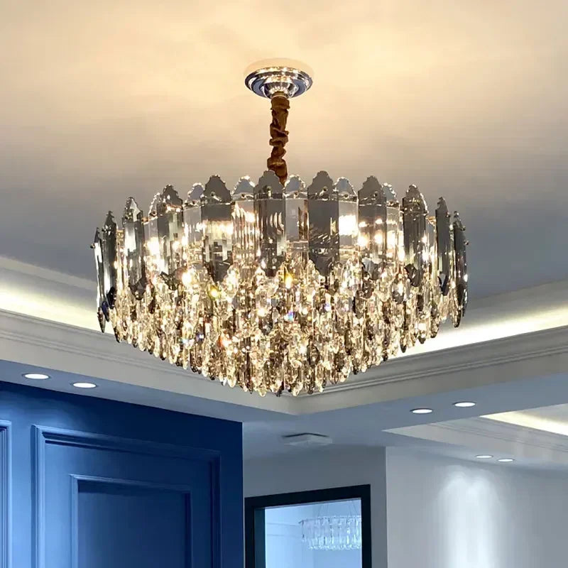 A detail of the light source within the crystal chandelier, showing the faceted crystal pieces reflecting the warm LED light.