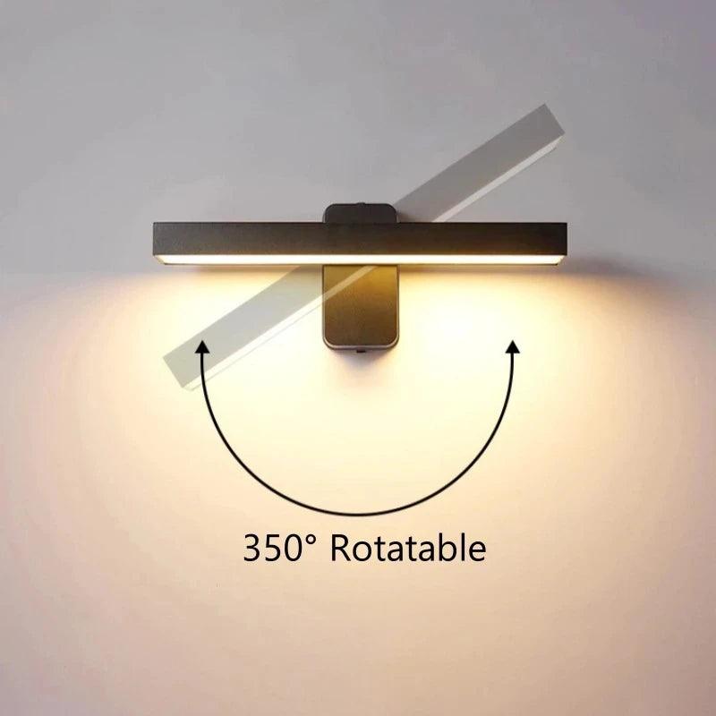 Black rotatable LED wall sconce with a rotational arc indicating 350� movement.