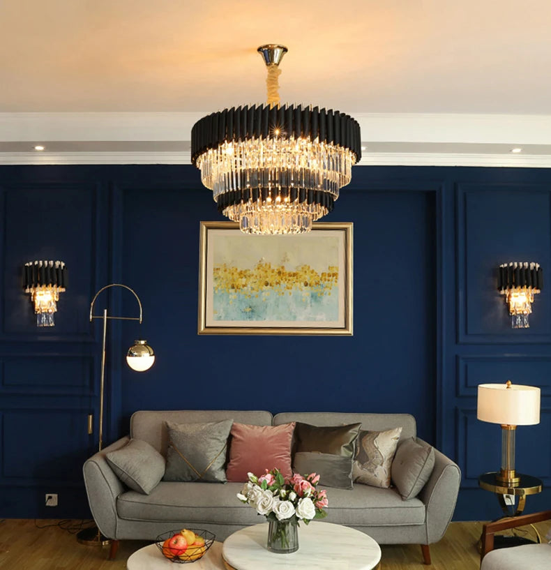 Living room with a chandelier, sofa, and wall art