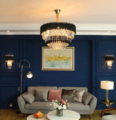 Living room with a chandelier, sofa, and wall art