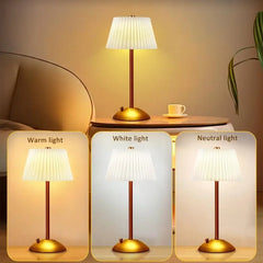 Table lamp emitting different colored lights on a neutral background