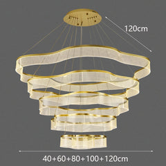 Modern chandelier with gold finish on a dark background