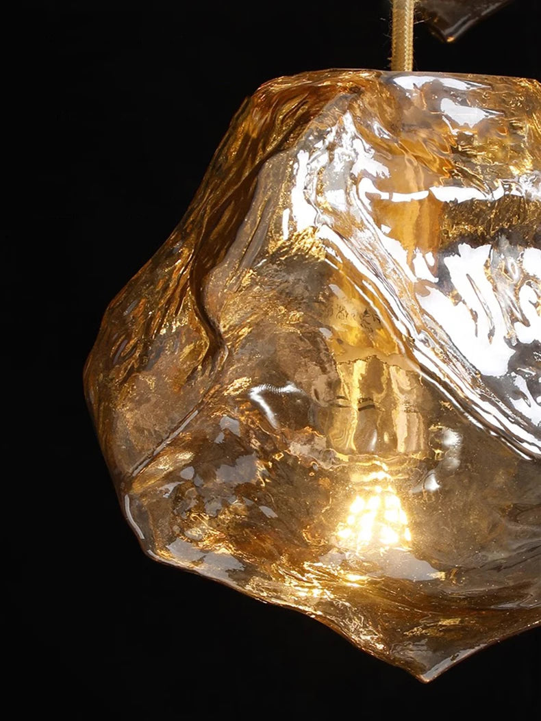 Close-up of a rough diamond crystal on a black background