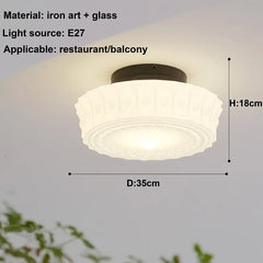 Ceiling light fixture with dimensions and material details on a plain background