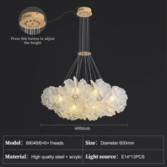 Chandelier with adjustable height feature on a dark background