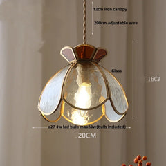 Pendant light with glass shade and metal frame, featuring dimensions and bulb information.