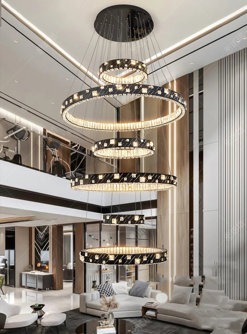 Modern interior with multiple circular chandeliers in a stylish living room.