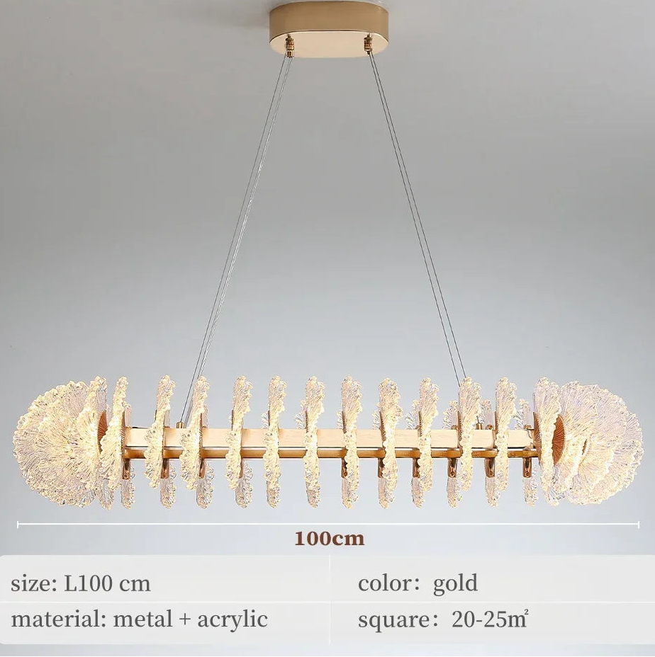 Gold pendant light with crystal details on a gray background
