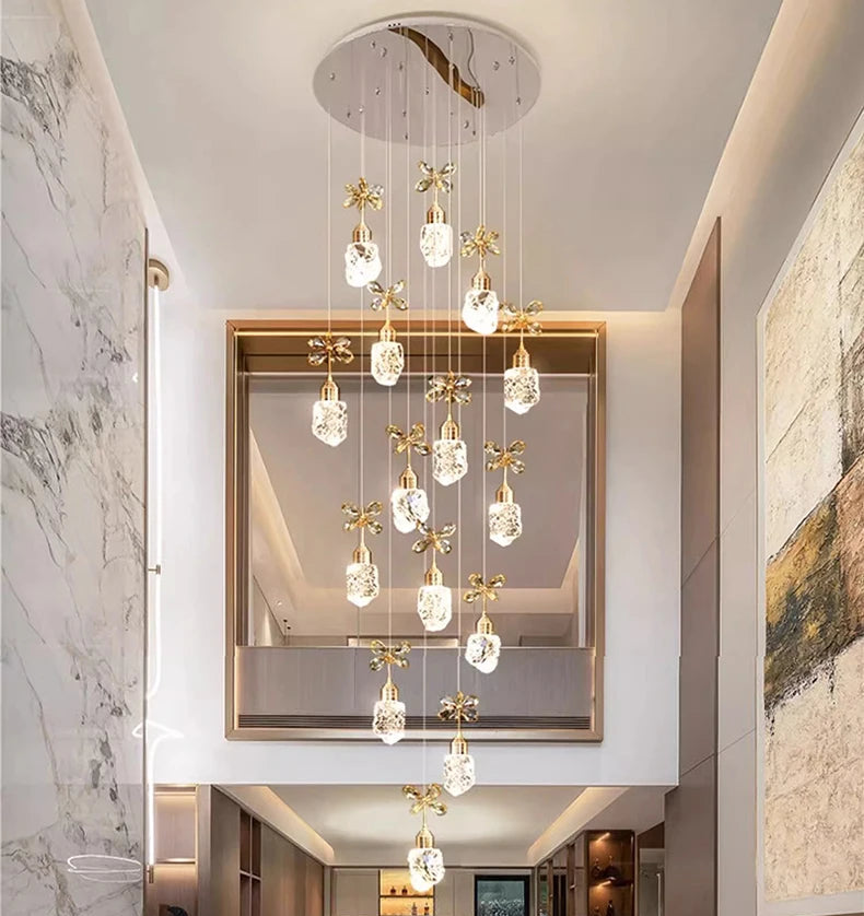 Luxurious interior design with a chandelier, sofa, and marble wall.