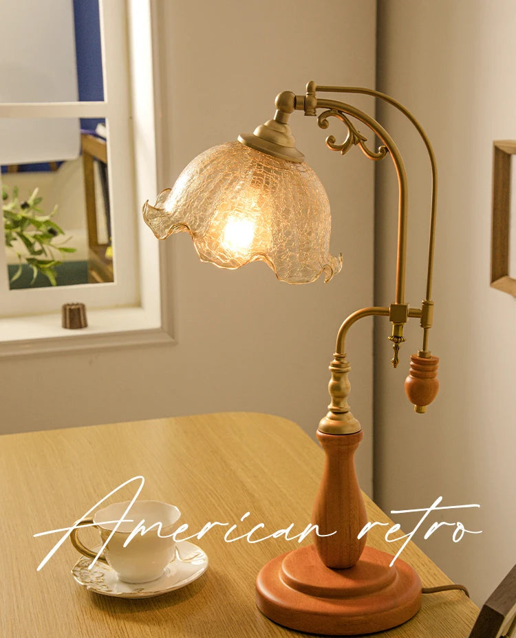 Vintage-style desk lamp on a wooden table with 'American retro' text.
