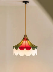 Ceiling light fixture with colorful lampshade on a plain wall background