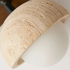 Close-up of a beige stone-like bracelet on a white background