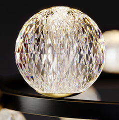 Crystal ball with intricate design on a dark background