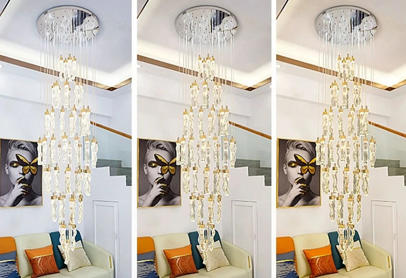 Chandelier hanging above a living room with colorful cushions.