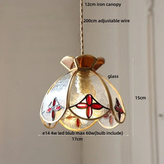 Decorative pendant light with stained glass design, measurements indicated.