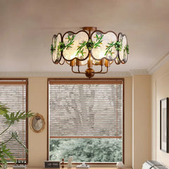Bronze Chandelier with Frosted Glass and Green Leaf Floral Accents