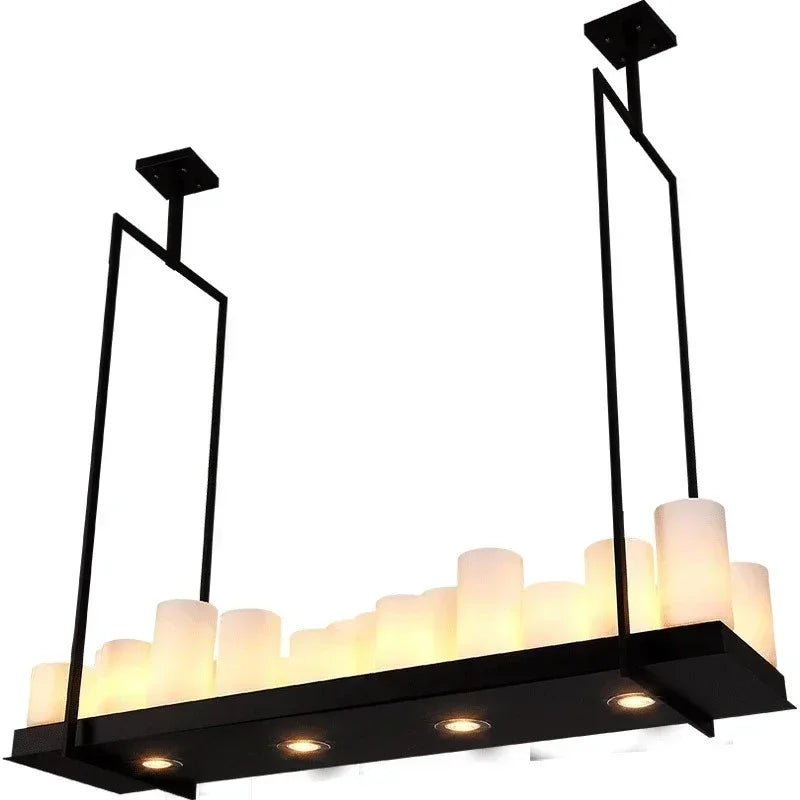 Modern chandelier with black frame and white candles on a white background