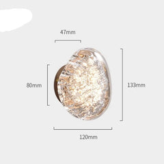 Round light fixture with dimensions labeled on a white background