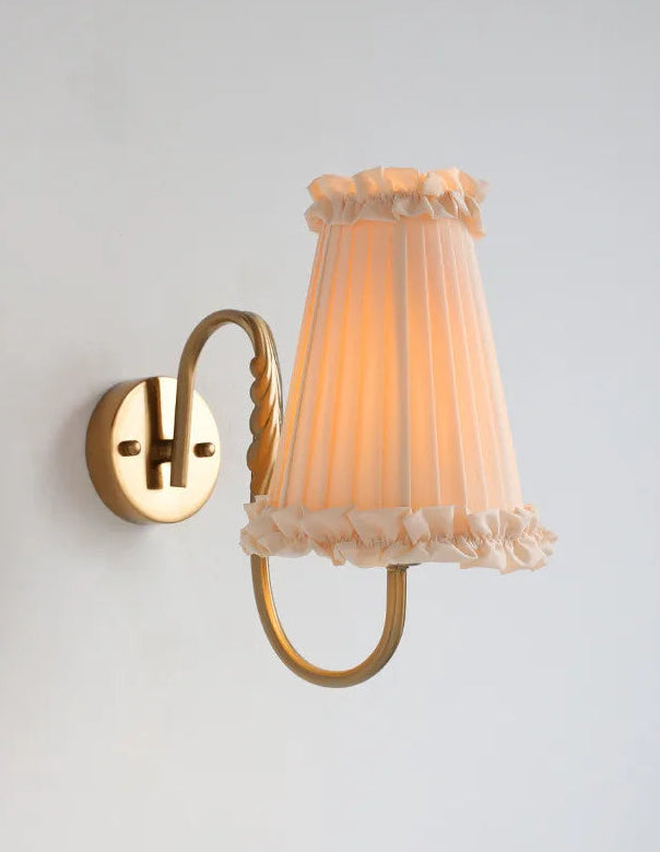 classic retro wall lamp casting warm light in a modern minimalist room