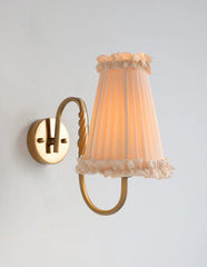 classic retro wall lamp casting warm light in a modern minimalist room