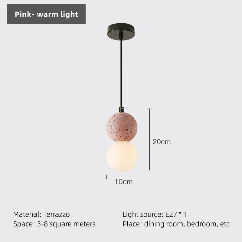 Pendant light with terrazzo design on a white background