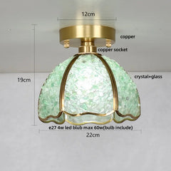 Ceiling light fixture with green crystal shade and gold frame, showing measurements and material details.