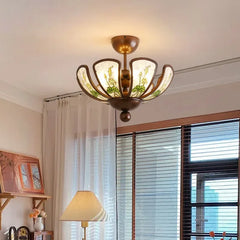 Bronze Chandelier with Frosted Glass and Green Leaf Floral Accents