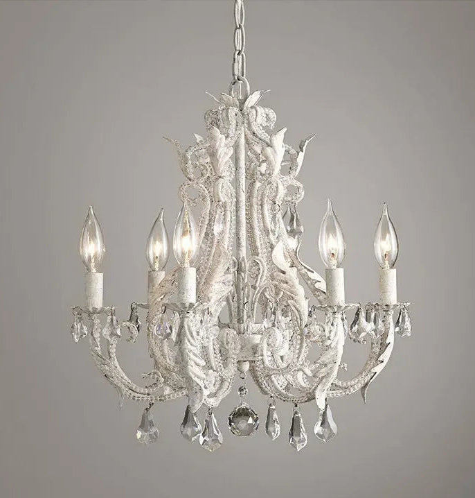 Crystal chandelier with five lights on a gray background