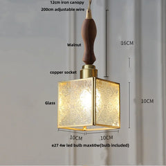 Pendant light with measurements and details on a gray background