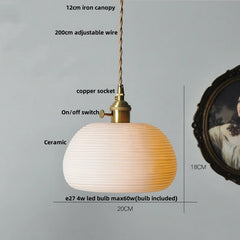 Pendant light with labeled components on a gray background