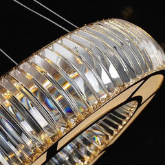 Close-up of a gold and crystal decorative element on a black background