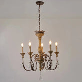 Decorative chandelier with five lights on a plain background