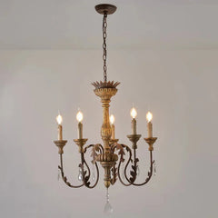 Decorative chandelier with five lights on a plain background
