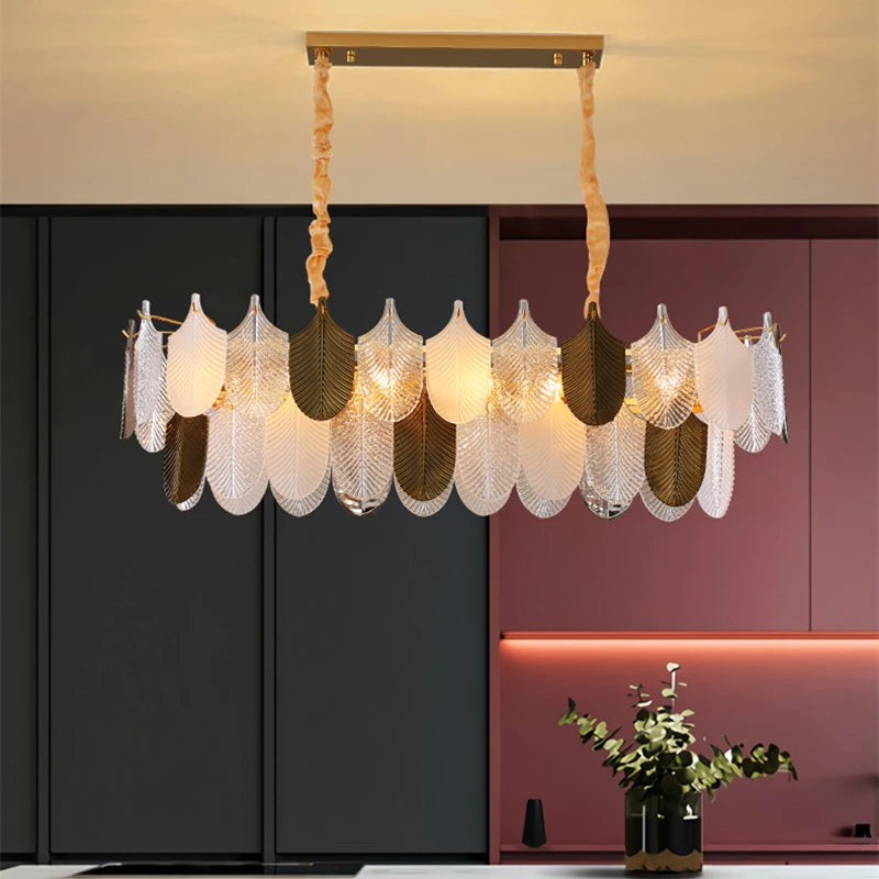 Modern chandelier hanging in a room with dark and pink walls.