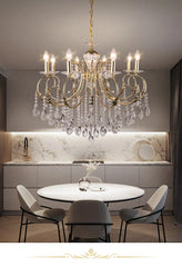 Gold Crystal Chandelier with Swirling Arms and Candle-Style Lights